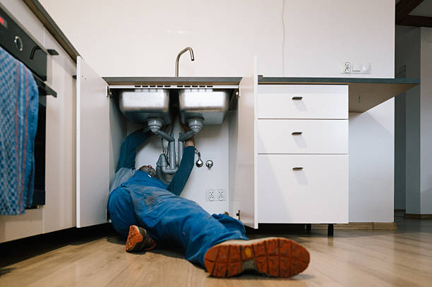 Professional Drain Cleaning technician working in Gifford, FL